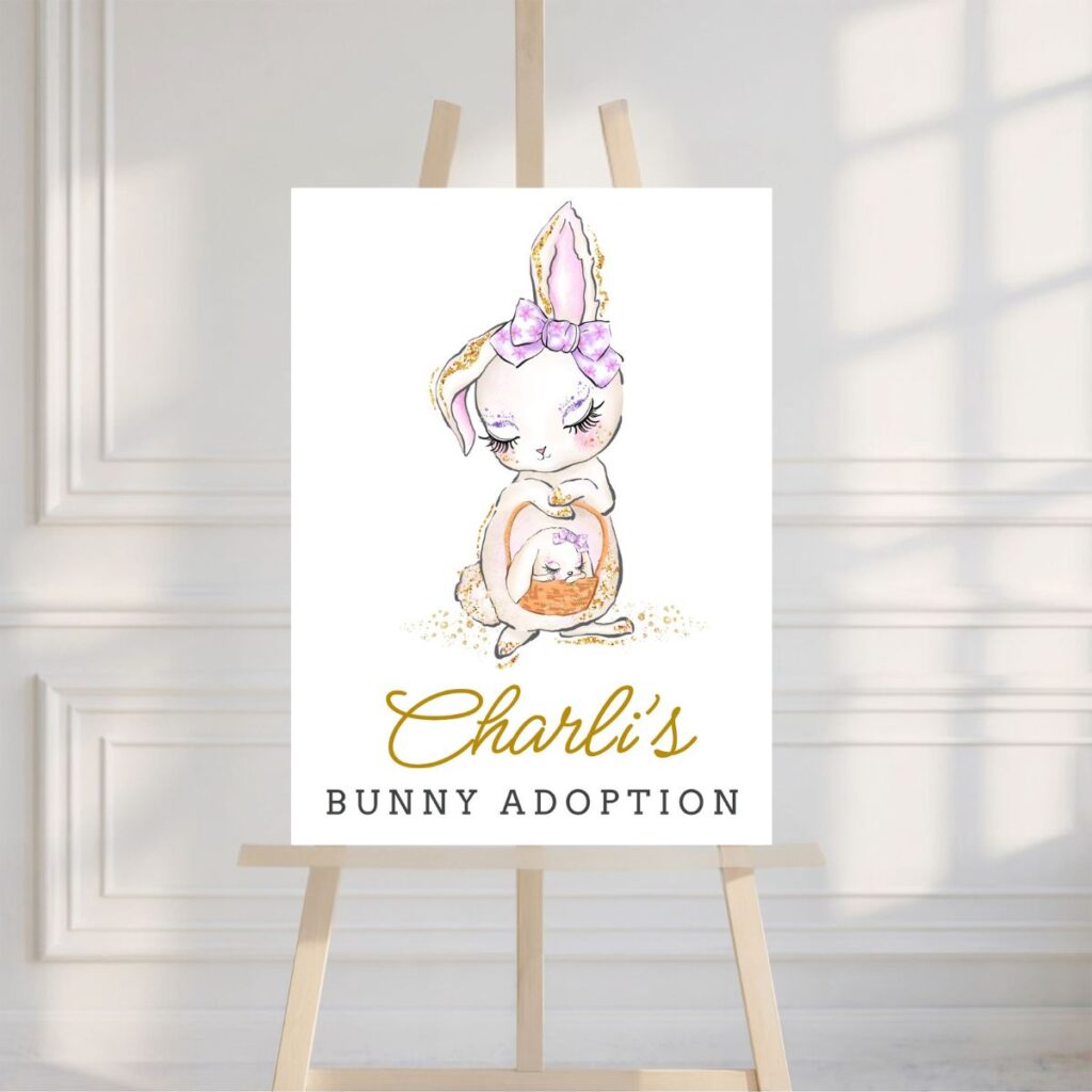 Easter Bunny Adoption party sign on an easel with a white wall background, promoting Inspired Party Design.