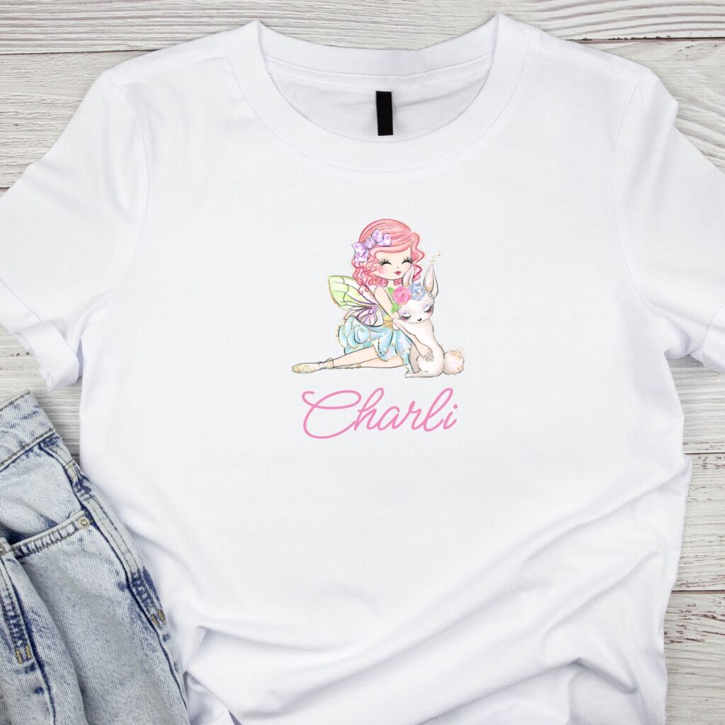 Easter fairy bunny-themed t-shirt with a personalised name printed on the front, designed as custom Inspired Party Merch.