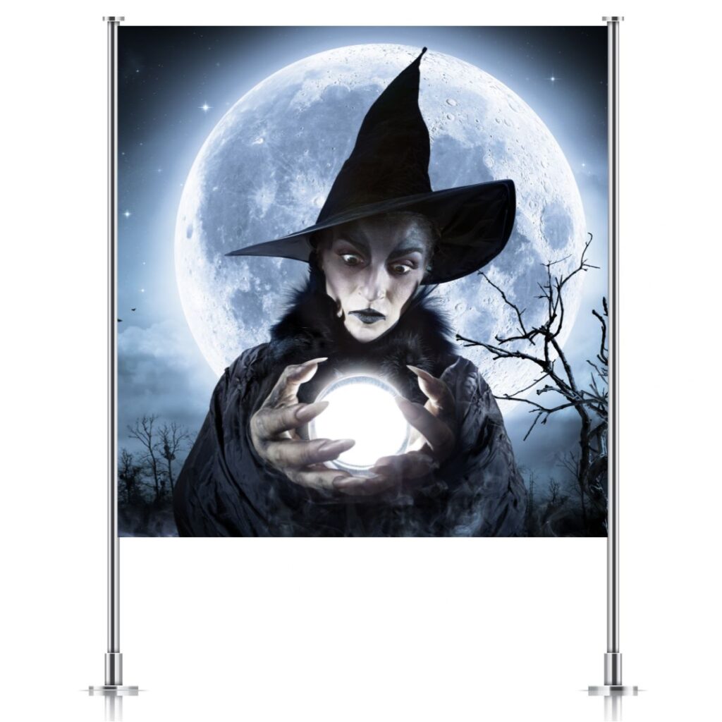 Spooky witch party backdrop featuring a large witch holding a crystal ball in front of a glowing full moon, promoting magical party backdrops from Inspired Party Backdrops.