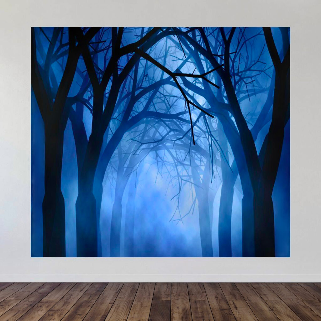Spooky forest backdrop from Inspired Party Backdrops displayed on wall, perfect for DIY cauldron party setup.