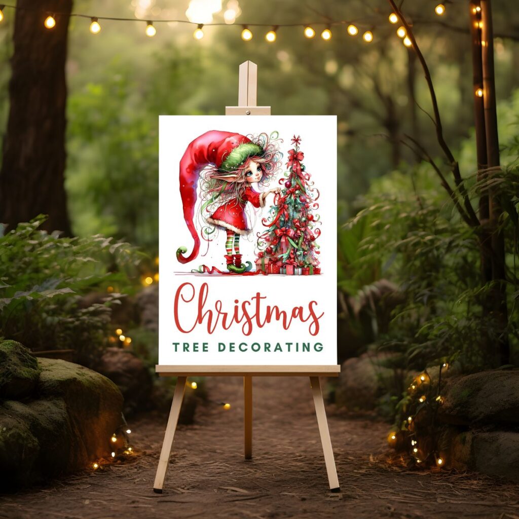 Christmas tree decorating party sign on an easel in a forest with fairy lights, featuring an elf decorating a tree to promote Inspired Party Design.