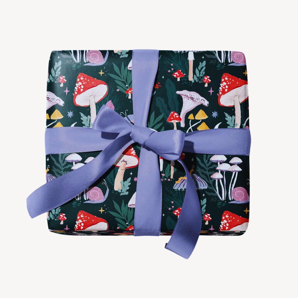 Kids fairy mushroom themed wrapped present used for pass the parcel party game.