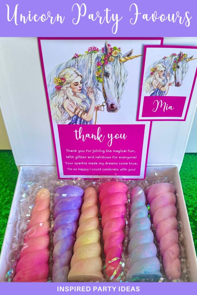 Kids unicorn chalk party favour with colourful horn shaped chalks in a white box with personalised nametag and thank you card.